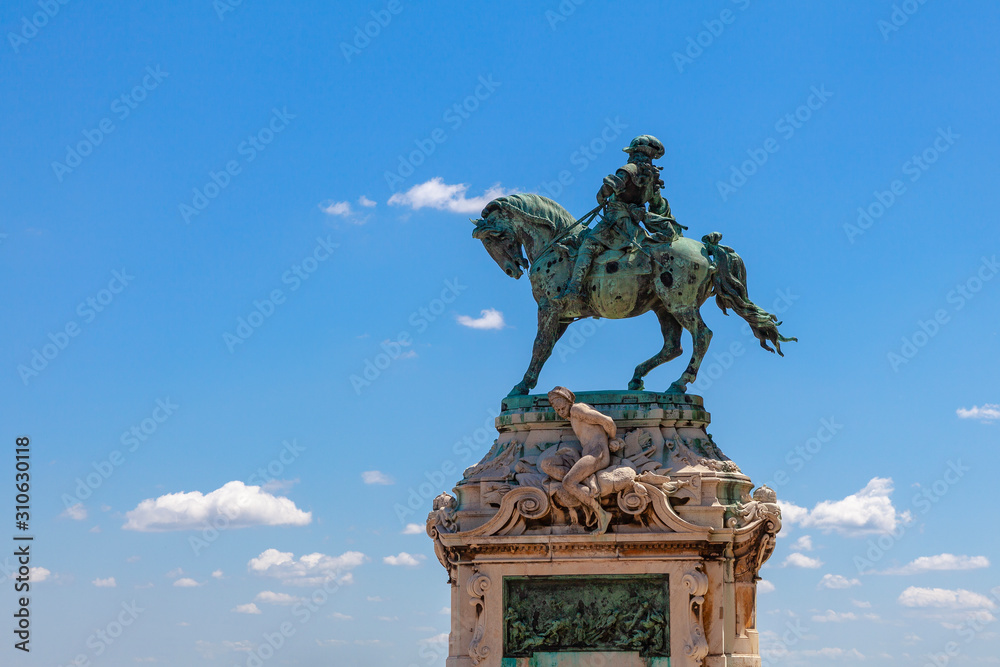 Equestrian monument to Eugene of Savoy in Budapest against a clear blue sky