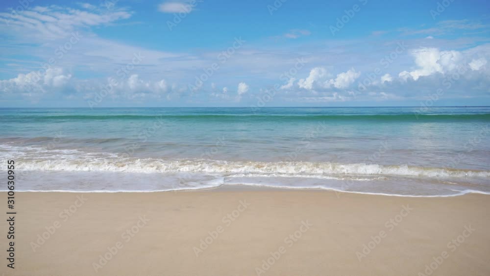 Beautiful tropical beach with blue sky and white cloud background. Summer vacation and nature environment concept.