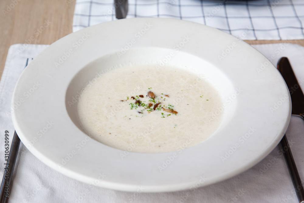 White creamy oringi and staw mushroom soup White creamy oringi and staw mushroom soup