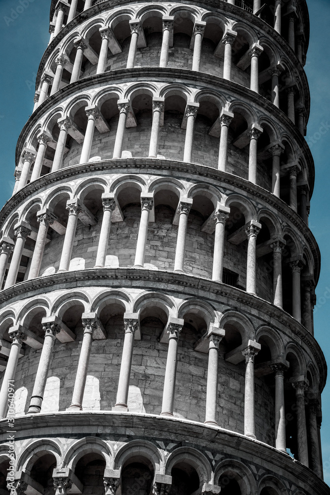 Texture fragment of the famous sloping tower with columns in Pisa, Italy. fascinating exotic amazing places. vintage effect.