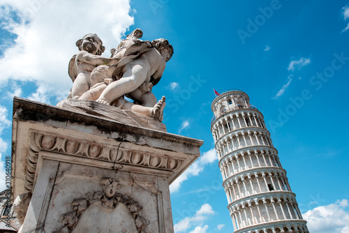 Obraz na płótnie Monument near the famous sloping tower with columns in Pisa, Italy. fascinating exotic amazing places. w salonie