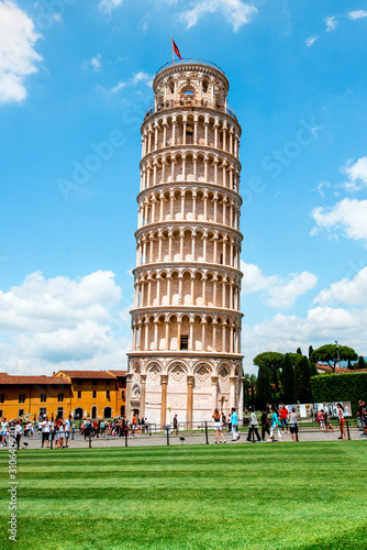 Obraz na płótnie Picturesque landscape with church and famous sloping tower in Pisa, Italy. fascinating exotic amazing places. w salonie