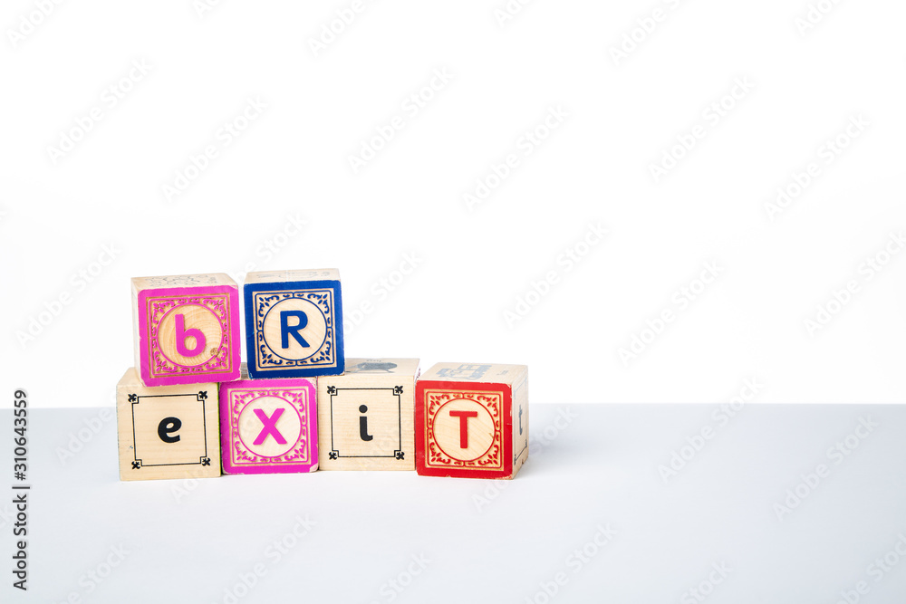 Obraz premium Childrens Wooden Alphabet Blocks Spelling the Word Brexit