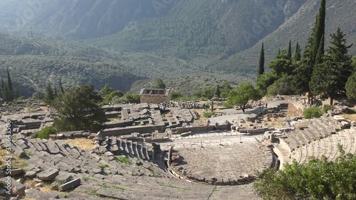 Ancient theatre of Delphi with temple of Apollo , panoramic view from above
