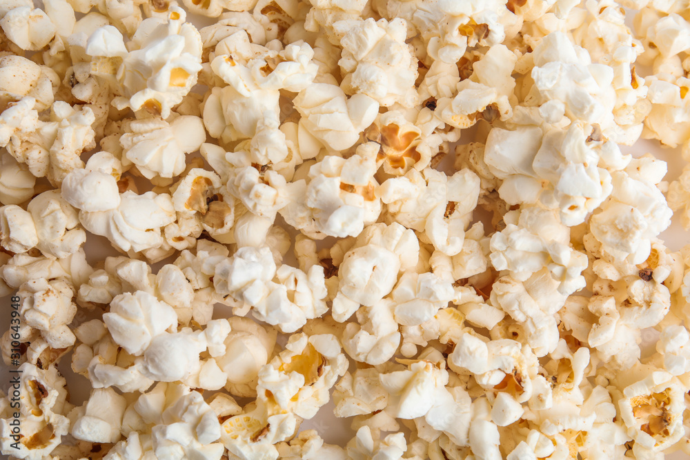 Tasty fresh pop corn as background, top view