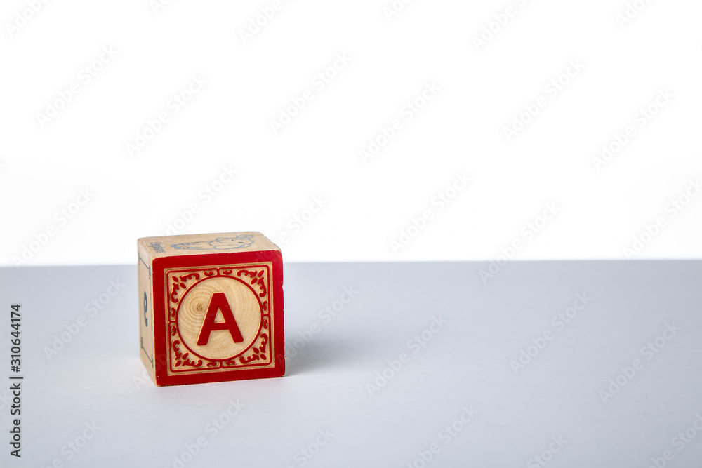 Childrens Wooden Alphabet Block Showing the Letter A Childrens Wooden Alphabet Block Showing the Letter A