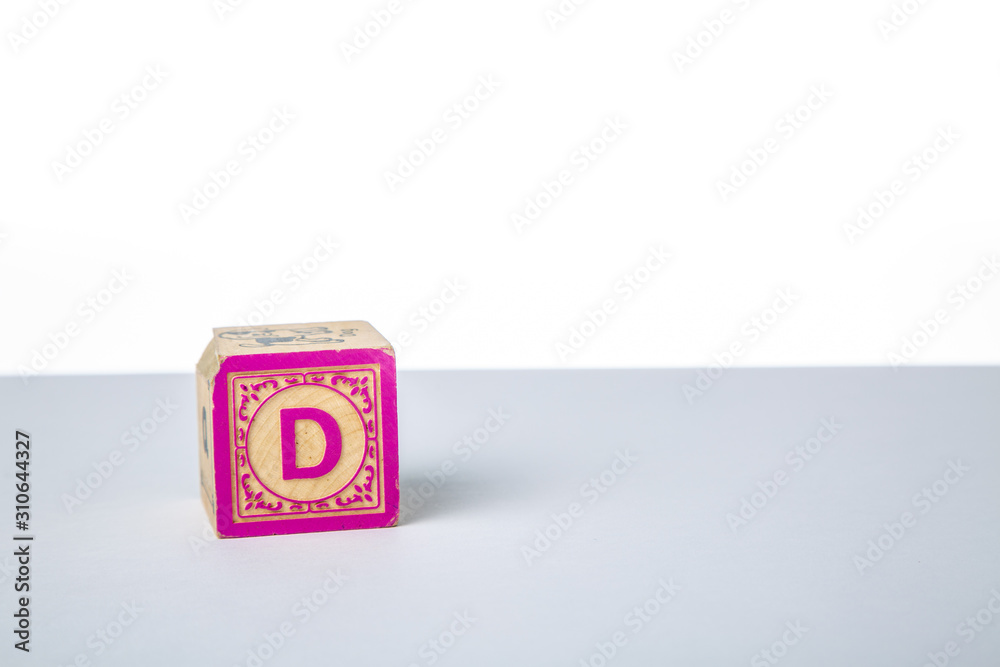 Childrens Wooden Alphabet Block Showing the Letter D Childrens Wooden Alphabet Block Showing the Letter D