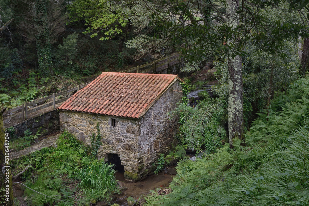 Traditional watermills in Cee, Galicia, Northern Spain. It was used to mill corn and cereal. It used to set up in torrents and rushing waters to move the millstone.