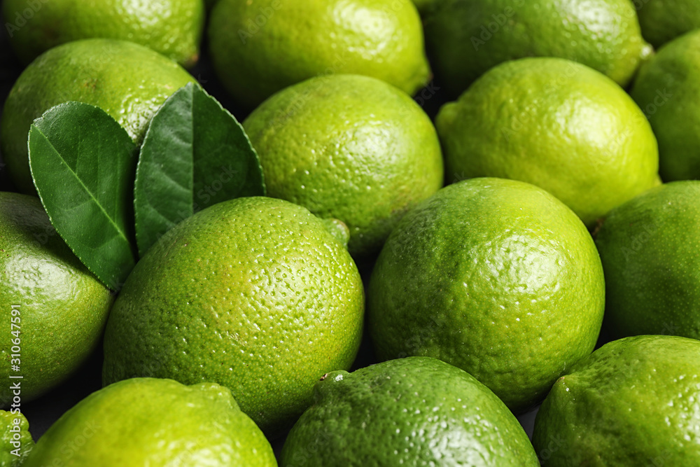 Fresh ripe juicy limes as background, closeup Fresh ripe juicy limes as background, closeup