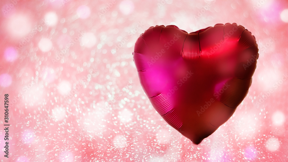 Red heart-shaped balloon on a festive pink background with sparkles and circles bokeh. The concept of love and Valentine's Day.