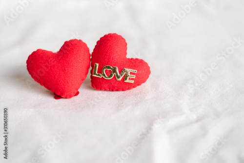 Love hearts on cotton texture background. Valentines day card concept. Heart for Valentines Day Background.