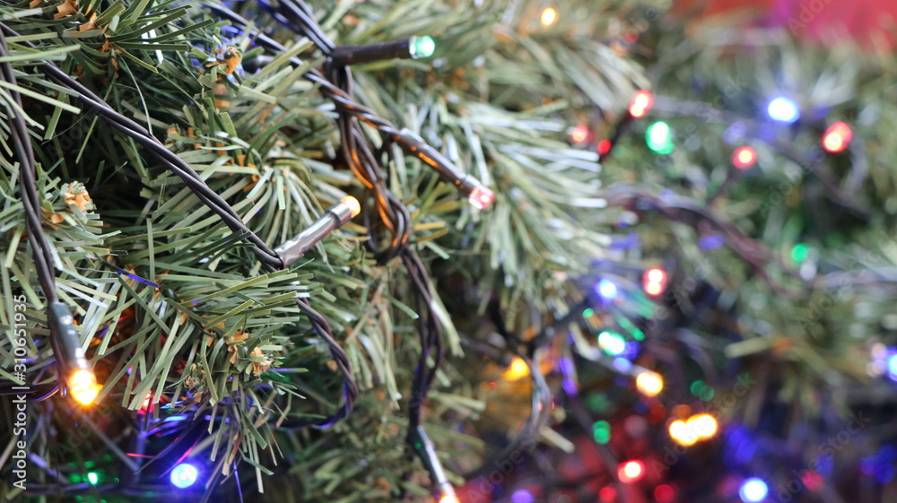 Christmas ornaments. Glitter decoration, light on green fir branch. Xmas tree celebration with pine and shiny sphere. Bright winter for new year holiday. Abstract objects, texture, background. Christmas ornaments. Glitter decoration, light on green fir branch. Xmas tree celebration with pine and shiny sphere. Bright winter for new year holiday. Abstract objects, texture, background.