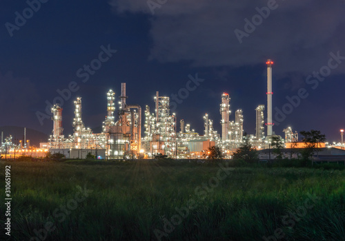 Landscape of Oil and Gas Refinery Manufacturing Plant., Petrochemical or Chemical Distillation Process Buildings., Factory of Power and Energy Industrial at Twilight Sunset., Engineering Petroleum. © tope007