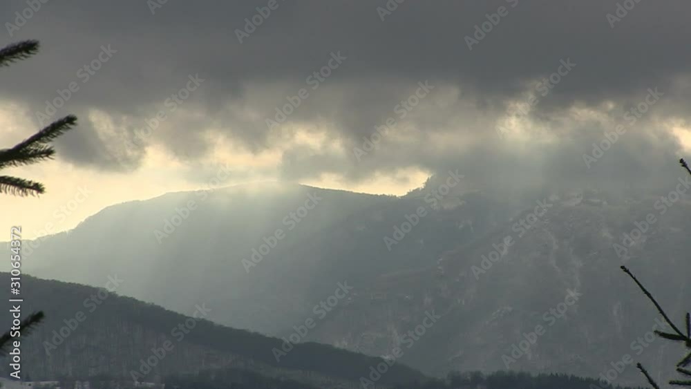Timelapse Of Dramatic Sky In The Winter Mountains Landscape. Clouds And Shadows Timelapse Of Dramatic Sky In The Winter Mountains Landscape. Clouds And Shadows