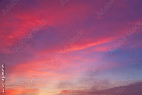 Background created from sky at sunset covered with red clouds. © Viliam