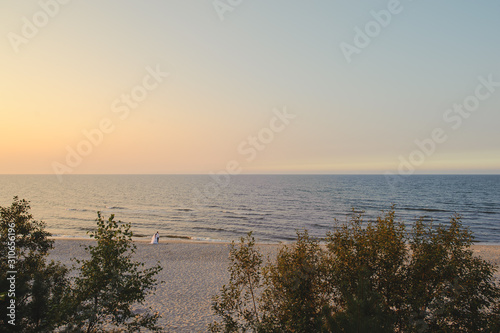 Baltic sea at beautiful sunrise in Poland beach