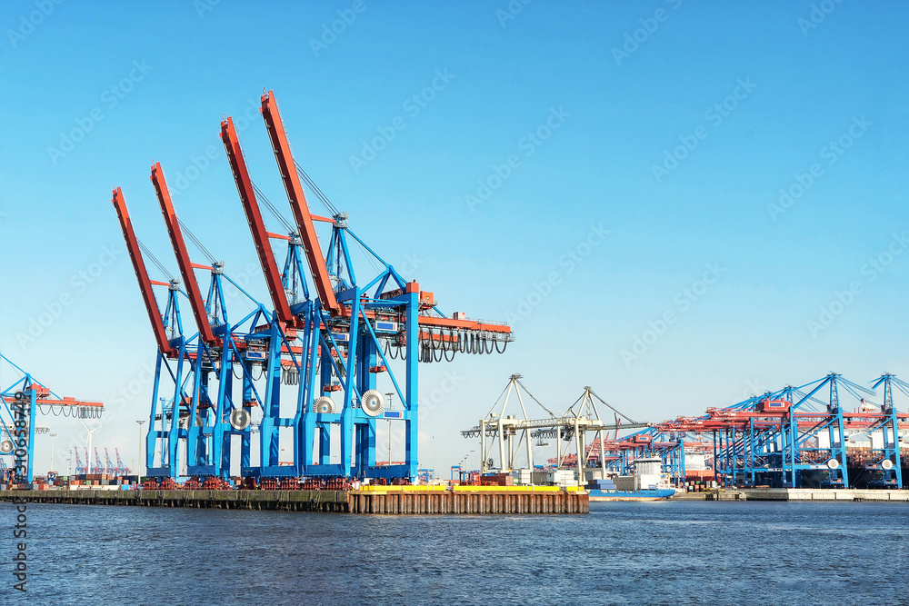 Industrial background panorama port with dockside cranes