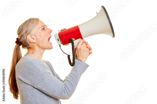 Elderly woman screams in megaphone photo
