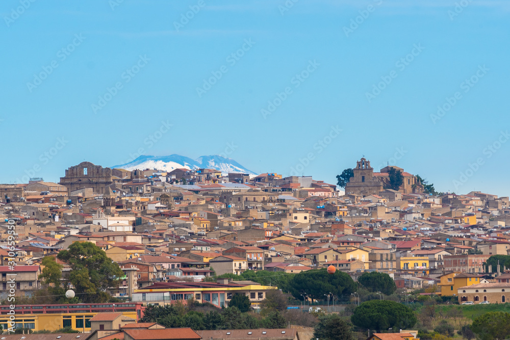 Cityscape of Mazzarino with the Mount Etna in the Background, Caltanissetta, Sicily, Italy, Europe Cityscape of Mazzarino with the Mount Etna in the Background, Caltanissetta, Sicily, Italy, Europe