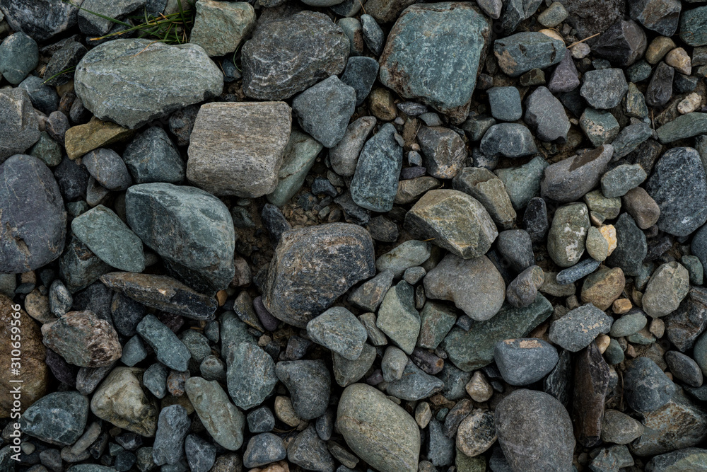 The texture of a shallow river stone. Pebble Background Image The texture of a shallow river stone. Pebble Background Image