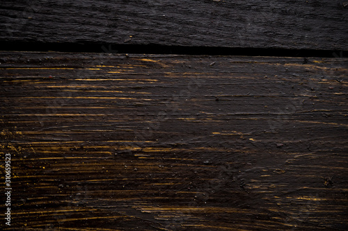 Dark wood texture. Background image macro photo of dark wood texture