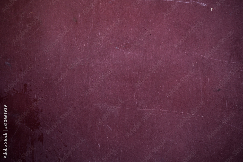 Naklejka premium Texture of an old wall covered with paint. Background image of a worn paint coated surface