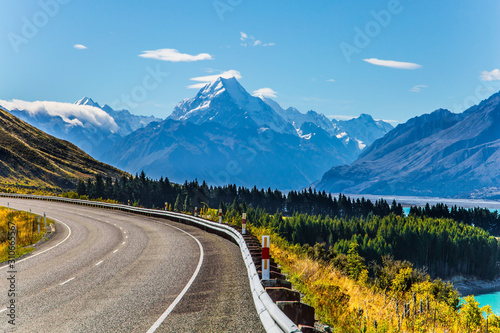 Highway runs along mountain lake