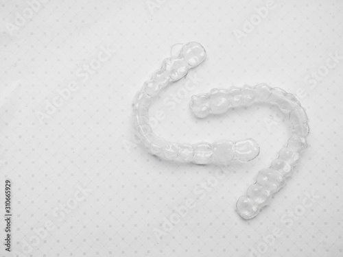 Obraz na płótnie Invisible aligners plastic braces dentistry retainers to straighten teeth temporary removable straightener w salonie