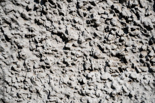 Texture photo of white rough concrete plaster