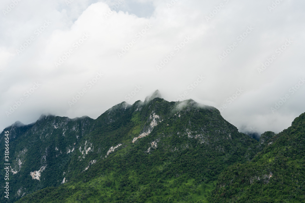 Mountains, tropical forests and rain clouds in Northern, Thailand.(Chiang Dao Province)