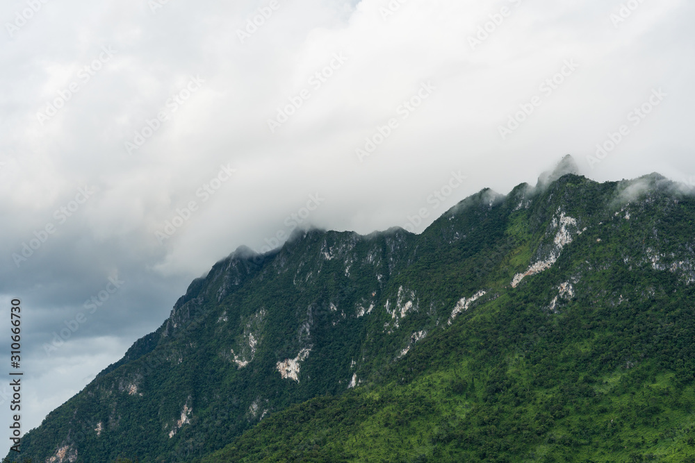 Mountains, tropical forests and rain clouds in Northern, Thailand.(Chiang Dao Province)