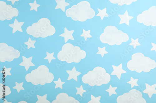 Blue sky painted on wall. Idea for baby room interior