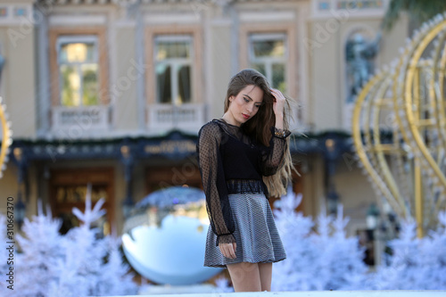 Фотография Woman With A Transparent Black Top And A Short Skirt