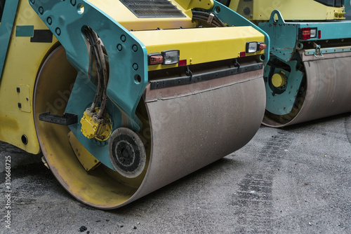 Steamroller. Asphalt. Road construction machinery.