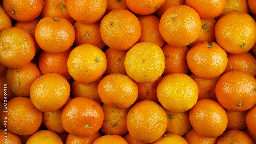 Bunch of fresh mandarin oranges on market, top view Bunch of fresh mandarin oranges on market, top view