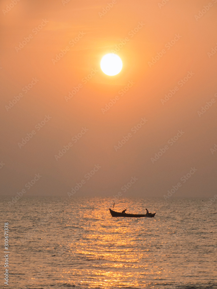 Fototapeta premium boat at sunset