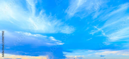 Fantasy abstract background, Colorful sunlight on blue sky and moving softly purple cloud before sunset