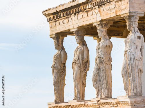 Caryatid statues as the columns of Erechtheion temple in Acropolis of Athens in Greece