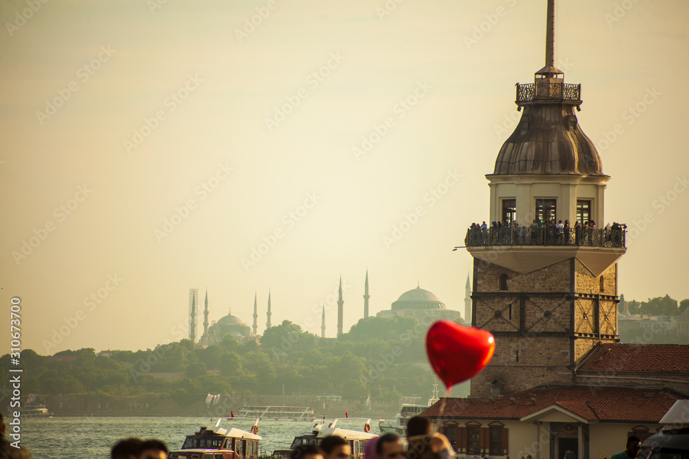 Old city silhouette. Lighthouse and temples. Istanbul.