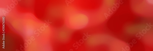 blurred horizontal background with firebrick, strong red and tomato colors and space for text