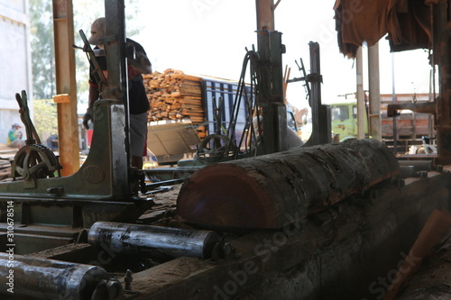 Wood factory workshop sawmill bangkirai production indonesia photo