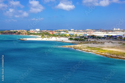 View of the main harbor on Aruba looking from a cruise ship down over the city and boats. Dutch province named Oranjestad, Aruba - beautiful Caribbean Island.