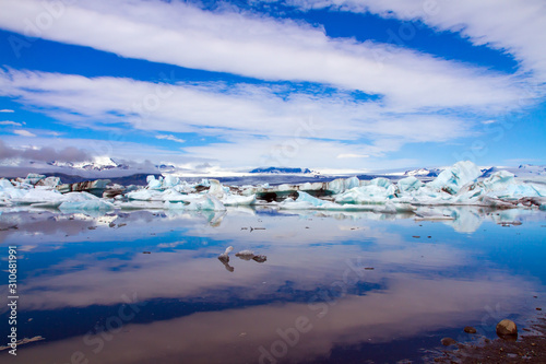 White and blue icebergs and ice floes