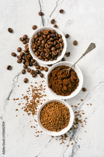 Roasted beans and ground coffee for morning espresso