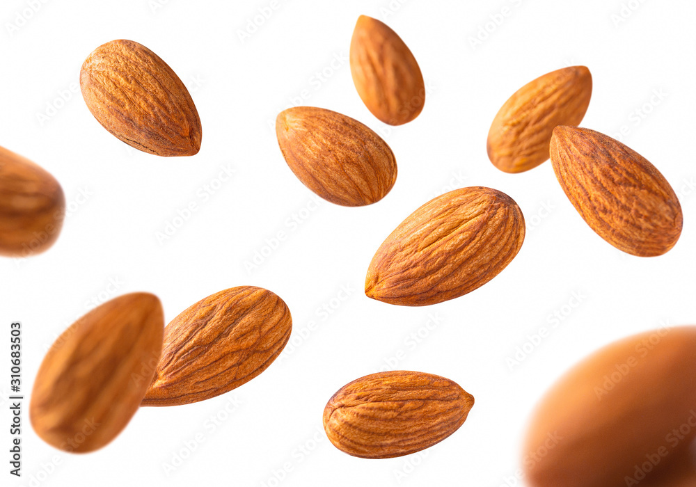 almond pieces flying Shallow depth of field .nuts concept almond pieces flying Shallow depth of field .nuts concept