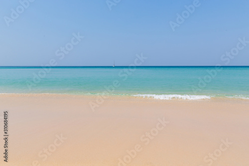 Beach scene, calm summer nature landscape. Blue sky and ocean waves © guardalex