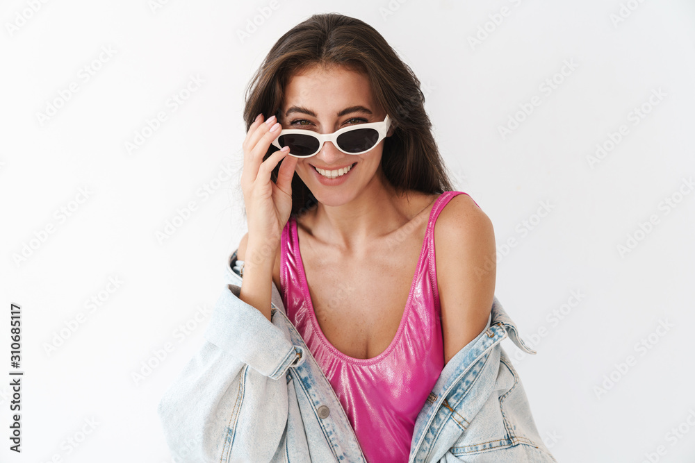Attractive young brunette woman wearing swimsuit Attractive young brunette woman wearing swimsuit
