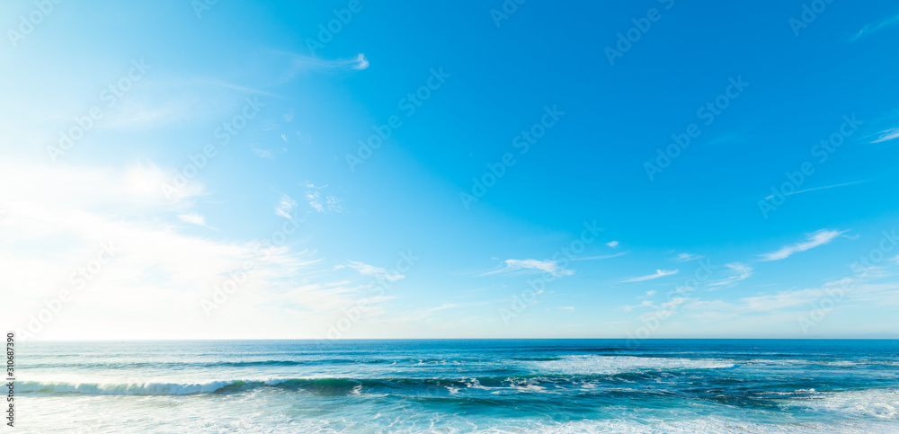 Sun shining over the blue sea in La Jolla beach