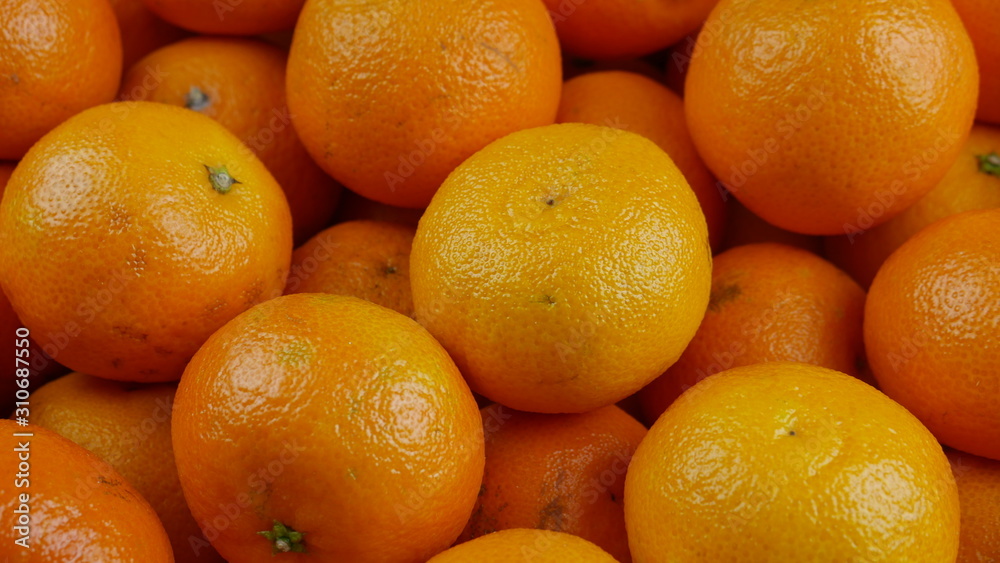 Bunch of fresh mandarin oranges on market, close-up Bunch of fresh mandarin oranges on market, close-up