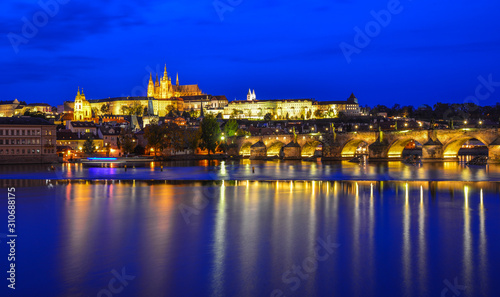 Photography Prague skyline and bridge over river in night